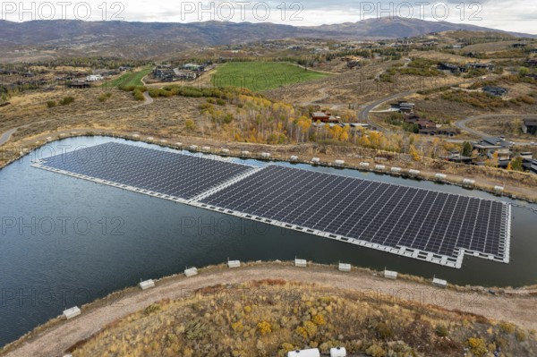 Park City, Utah - Floating solar panels provide power for Mountain Regional Water. The solar array is on the raw water storage pond at the water utility's Signal Hill Treatment Plant