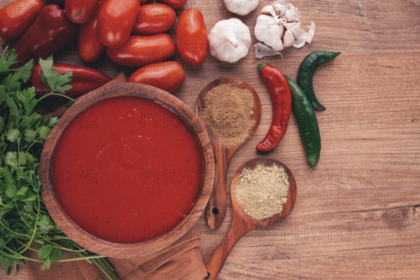 Georgian sauce, Satsebeli sauce, tomato and sweet pepper sauce, with spices, in a wooden bowl, homemade, no people