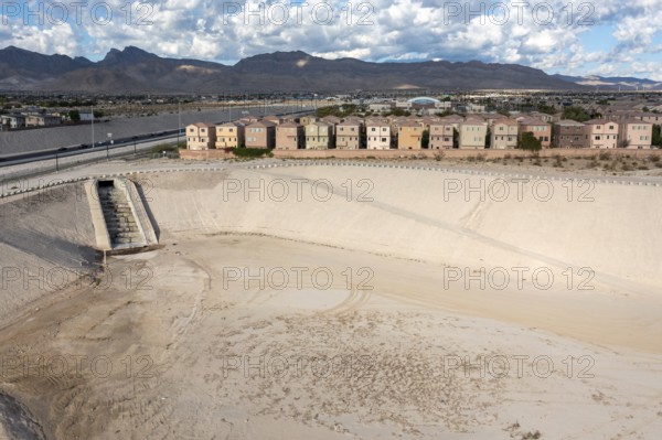 Las Vegas, Nevada - A water detention basin, one of about 100 built by the Clark County Regonal Flood Control District to temporarily collect stormwater, protecting neighborhoods from flooding
