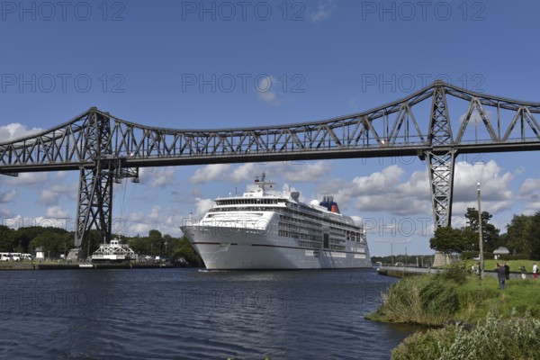 Cruise ship EUROPA 2 passes the Rendsburg transporter bridge in the Kiel Canal, NOK, Kiel Canal, Kielcanal, Schleswig-Holstein, Germany