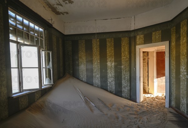 Former dwelling house full of sand, Kolmanskop, restricted diamond area, Karas region, Namibia