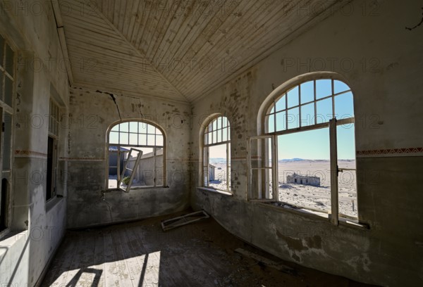 View into the desert from a former dwelling house, Kolmanskuppe, near Lüderitz, Karas Region, Namibia