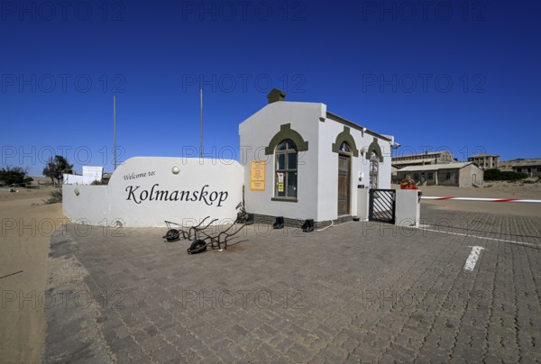 Entrance gate to the former diamond settlement of Kolmanskop, restricted diamond area, near Lüderitz, Karas region, Namibia