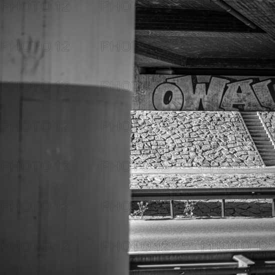 Concrete bridge with graffito in Münsingen on the Swabian Alb, Baden-Württemberg, Germany, for editorial use only