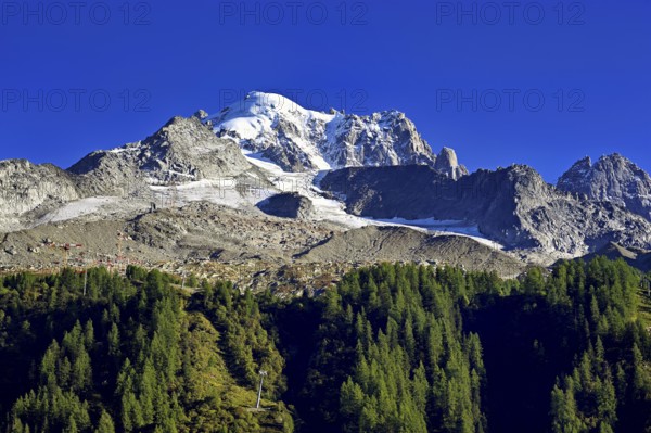 Aiguille des Grands Montets and snow-covered Aiguille Verte, Chamonix-Mont-Blanc, Haute-Savoie, France