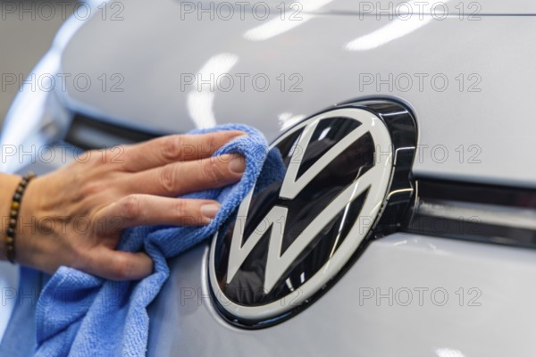 Electric car production in the assembly halls of VW in Zwickau. VW logo, Zwickau, Saxony, Germany