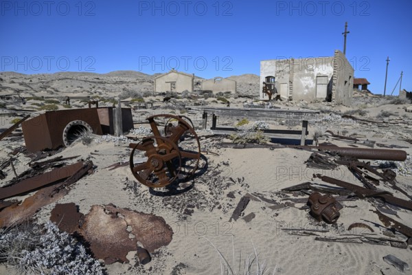 Ruined buildings in the desert sand, Pomona, restricted diamond area, near Lüderitz, Karas region, Namibia