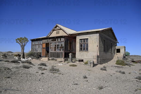 Dilapidated building in the desert sand, Pomona, restricted diamond area, near Lüderitz, Karas region, Namibia