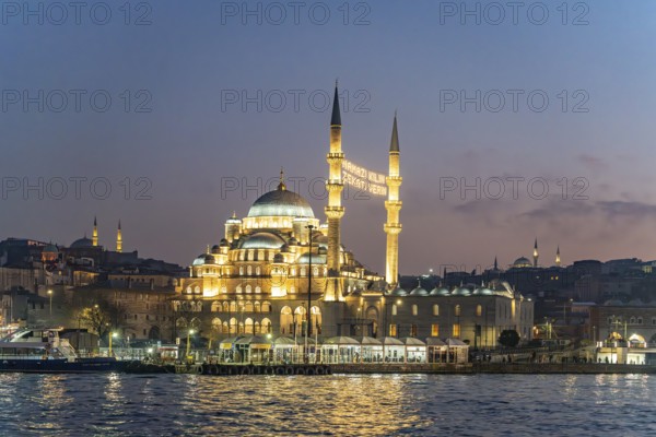 The New Mosque Yeni Cami at dusk, Eminönü, Istanbul, Turkey