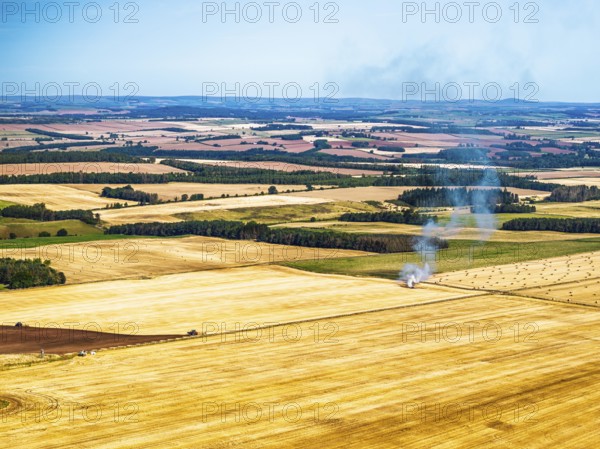 Scottish fields over Waterloo Monument from a drone, Jedburgh, Scotland, UK