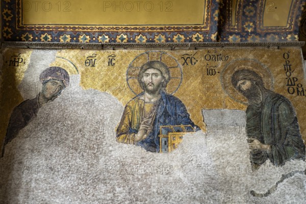 Deësis mosaic with Jesus Christ as Pantocrator in the interior of today's Hagia Sophia mosque or Church of St Sophia, former Byzantine church and museum in Istanbul, Turkey