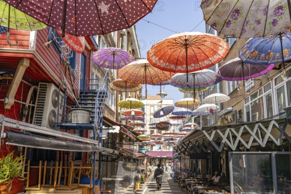 Colourful umbrellas over Umbrella Street Hoca Tahsin in Karaköy, Istanbul, Turkey