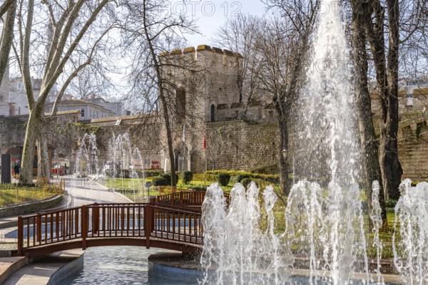 Fountain in Gülhane Park and the walls of Topkapi Palace in Istanbul, Turkey