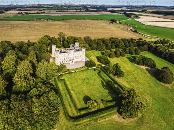Wedderburn Castle and Barns over fields from a drone, Duns, Berwickshire, Scotland, UK