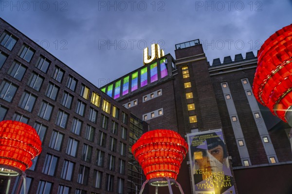 Illuminated sculptures of Dortmund roses in front of Dortmund's landmark U, Centre for Art and Creativity at dusk, Dortmund, North Rhine-Westphalia, Germany