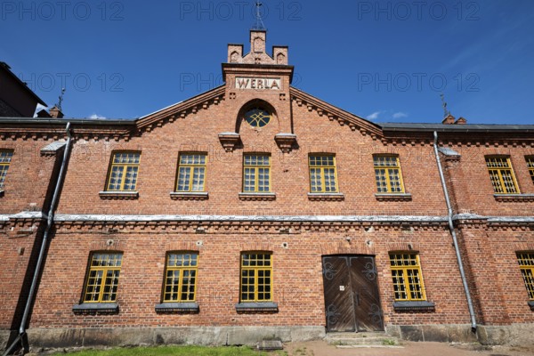 Brick façade with inscription Werla, former paper factory and mill for the production of groundwood pulp board, UNESCO World Heritage Site Factory Village Verla, Maailmanperintökohde Verlan puuhiomo ja pahvitehdas, Verla Rapids, Kymenlaakso, near Kouvola, Finland