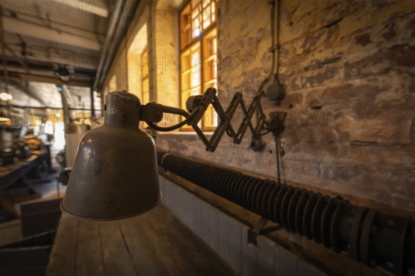 Old industrial lamp, former paper mill and groundwood pulp board mill, UNESCO World Heritage Site Verla Factory Village, Maailmanperintökohde Verlan puuhiomo ja pahvitehdas, Verla Rapids, Kymenlaakso, near Kouvola, Finland
