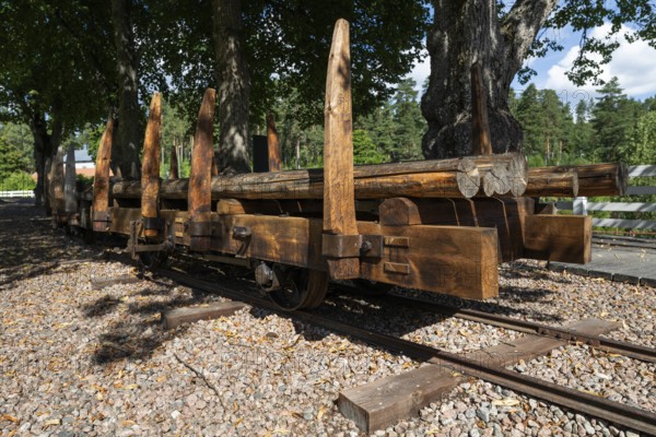 Railway tracks and wagons on rails for timber transport, former paper factory and mill for the production of groundwood pulp board, UNESCO World Heritage Site Verla Factory Village, Maailmanperintökohde Verlan puuhiomo ja pahvitehdas, Verla Rapids, Kymenlaakso, near Kouvola, Finland