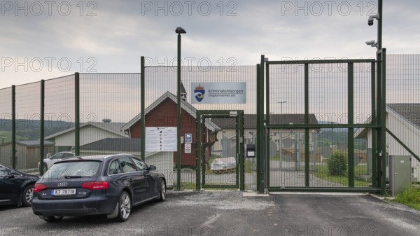 Locked entrance with fence and Tor tor to a prison, near Eidsvoll, Norway