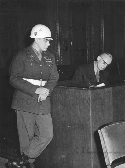 Nuremberg Trials, main war criminals, an American soldier observes the defendant v. Ribbentrop. Nuremberg 1946