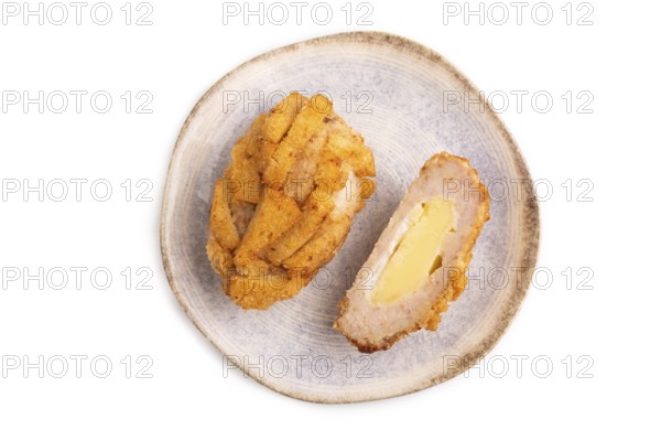 Chicken schnitzel on blue plate isolated on white background. top view, flat lay, copy space