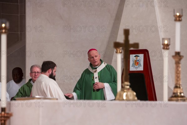 Detroit, Michigan USA - 5 October 2025 - The Catholic Archdiocese of Detroit marks the World Day of Migrants & Refugees with a pilgrimage walk followed by a mass lead by Archbishop Edward Weisenburger (center). The event was held at the Blessed Sacrament Cathedral