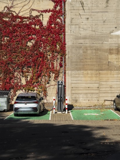 A car charges at a charging station for electric cars at a petrol station in Düsseldorf, Germany