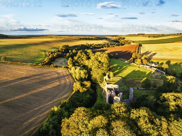 Ruins of Hailes Castle over River Tyne from a drone, East Linton, East Lothian, Scotland, UK