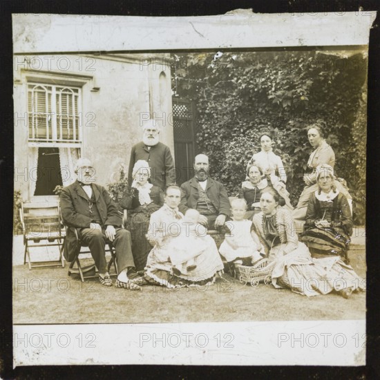 Portrait group photograph three generations prosperous middle-class Victorian Edwardian family, England, c 1900