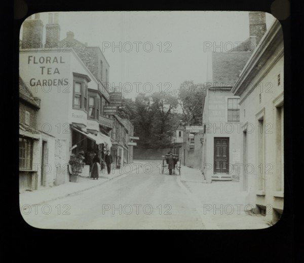 Shops and tea gardens advertised on buildings, Pegwell Bay, Ramsgate, c 1900 the building on the right is now the Belle Vue Tavern