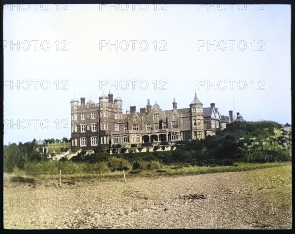 Colourised magic lantern slide of Bawdsey Manor from the beach, Suffolk, England, UK c 1910
