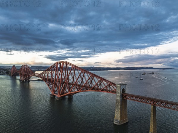 Forth Bridge from a drone, Queensferry Crossing, Forth Estuary, Scotland, United Kingdom