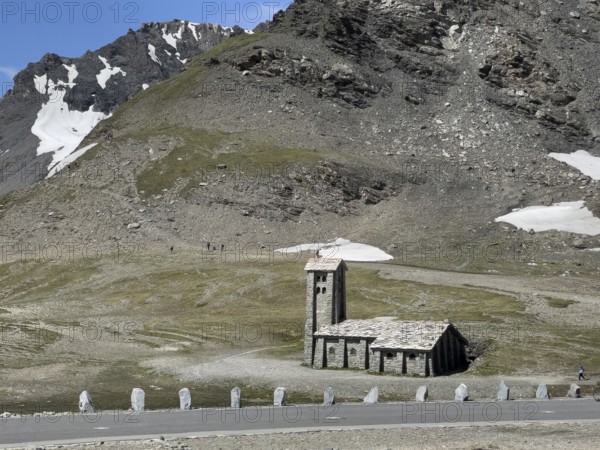 View of Christian chapel mountain chapel Chapelle Notre-Dame-de-Toute-Prudence next to pass summit of highest asphalted passable 2764 2770 metres high alpine pass Col de l'Iseran Iseranpass, Iseran, Col de l' Iseran, departmental road D902, Route des Grandes Alpes, Département Savoie, Region Auvergne-Rhône-Alpes, Graian Alps, France