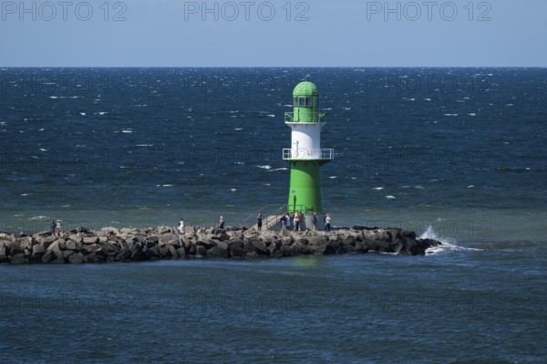 Green-white lighthouse, pier light west pier, waves, sea, Baltic Sea, Warnemünde, Rostock, Mecklenburg-Western Pomerania, Germany