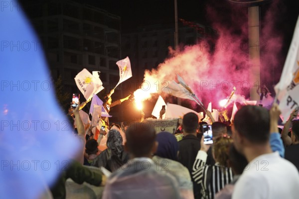 Gaziantep, Türkiye – May 28, 2023. Turkish citizens wave flags of Türkiye and the ruling Justice and Development Party (AKP) after President Recep Tayyip Erdogan secured a third presidential term, Gaziantep, Gaziantep, Türkiye