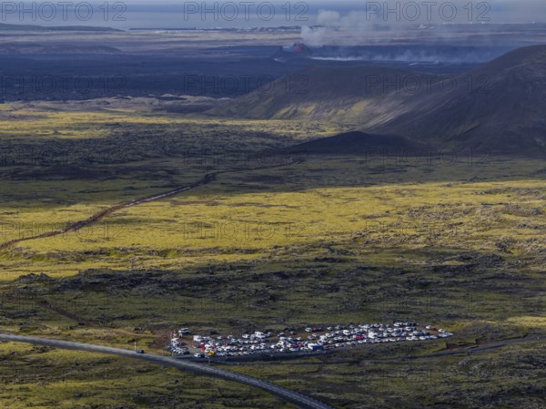 Lava, lava field, summer, cloudy, sunny, volcanic eruption, aerial view, tourists, car park, July 2025, Grindavik, Sundhnúkur crater series, Fagradalsfjall, Reykjanes, Iceland