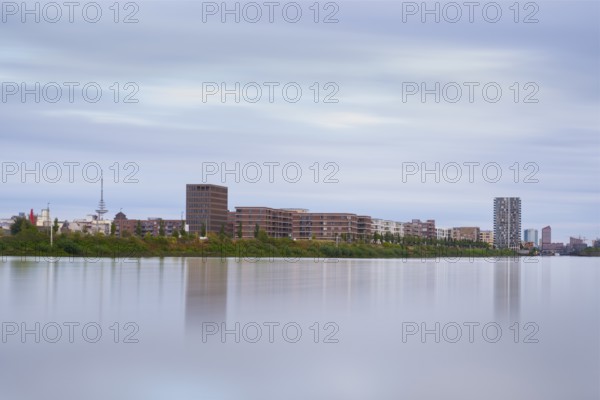 View over the Weser to the Überseestadt, long exposure, Bremen, Germany