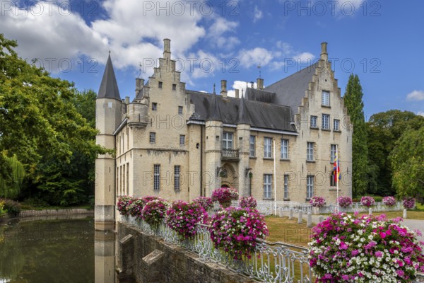 Kasteel Cortewalle, 15th century moated castle in Flemish Renaissance style at Beveren in summer, Waasland, East Flanders, Belgium