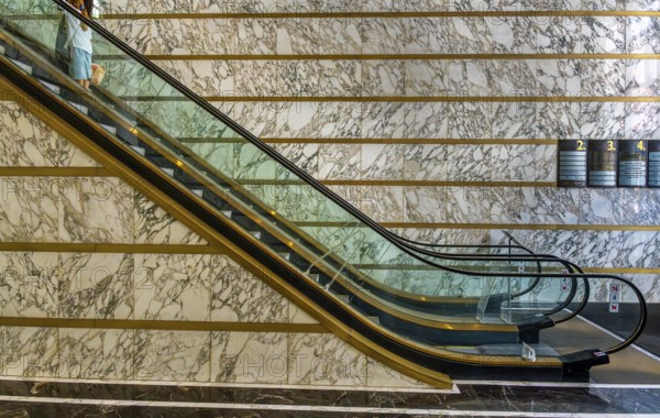Escalator in the foyer of the Meoclinic, private practices in Friedrichstraße, Berlin, Germany