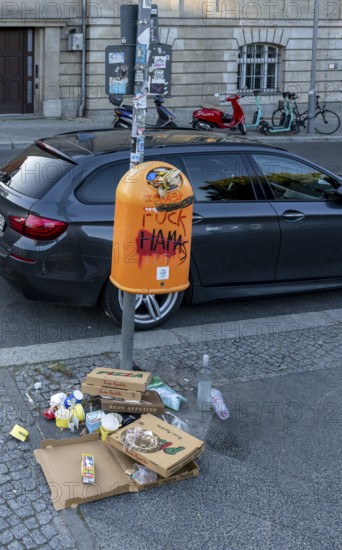 Urban rubbish, food waste at a wastepaper basket at the Bode Museum, Berlin, Germany