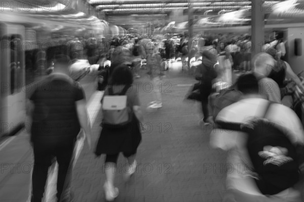 Travellers on the platform at Munich Central Station, Movement, Munich, Bavaria, Germany