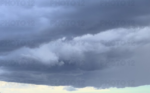 Gathering low pressure area with rain front dark stratus clouds Nimbostratus clouds, international