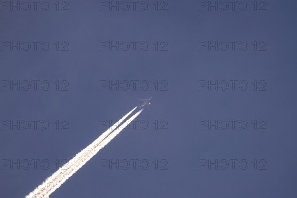 Blue sky with vapour trails, Germany