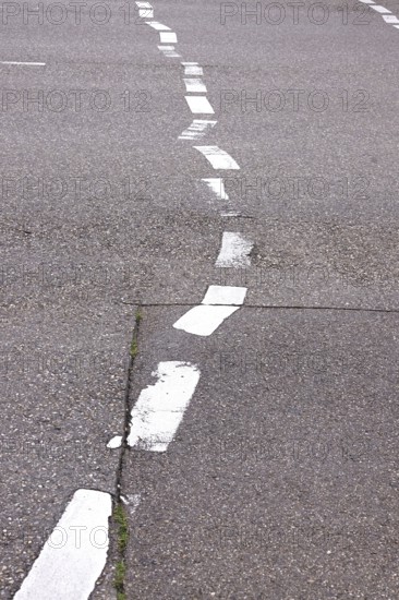 Displaced road markings, symbolic image of need for renovation, Germany