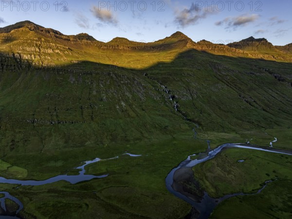 Mountains, morning light, river, river delta, river course, coast, summer, aerial view, Stodvarfjördur, East Fjords, Iceland
