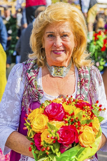 The boss of the historic Oktoberfest attraction Teufelsrad, Elisabeth Polaczy, Wiesnwirte Platzkonzert, Festwiese, Theresienwiese, Oktoberfest, Munich, Upper Bavaria, Bavaria, Germany