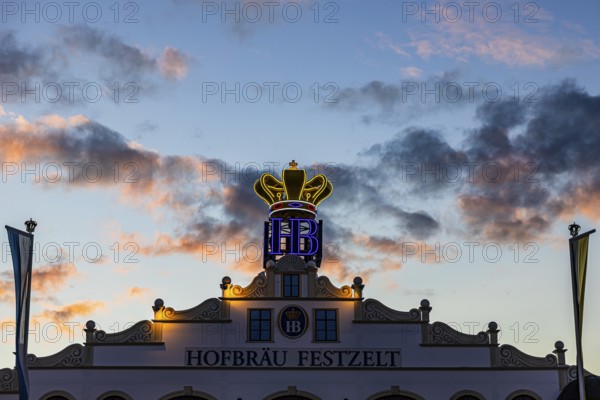 Illuminated crown of the Hofbräu marquee in the evening light, Festwiese, Theresienwiese, Oktoberfest, Munich, Upper Bavaria, Bavaria, Germany