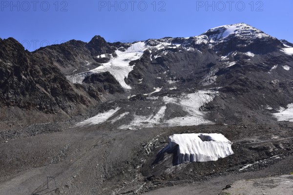 Weißseespitze (3532 m) in the foreground the covered accessible crevasse on the Kaunertal Glacier, Kaunertal, Tyrol, Austria