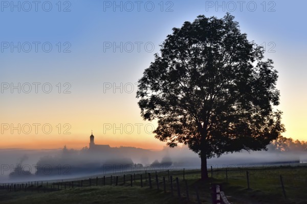 Sunrise at the pilgrimage church of the Visitation of the Virgin Mary in Ilgen im Allgäu, Bavaria, Germany