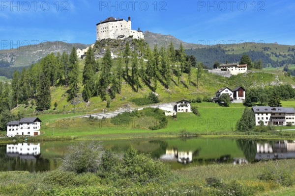 Tarasp Castle in the Lower Engadine above Lake Tarasp, Graubünden, Switzerland